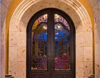 Traditional Designs Feature Wrought Iron Doors