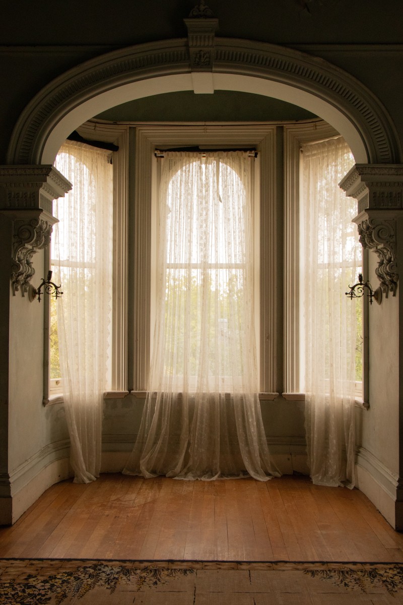window with a sheer curtain 